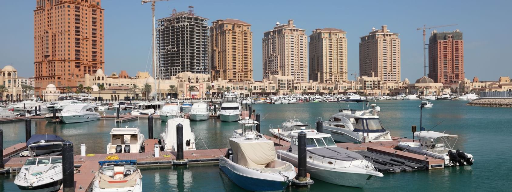 Boats parked in the Marina at the Pearl Doha near Strato Hotel by Warwick Doha