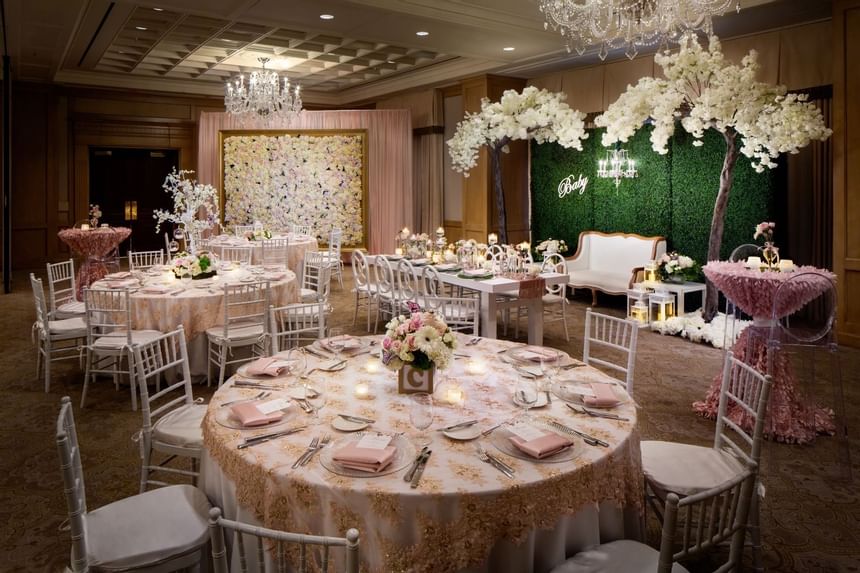 Banquet tables with flower decor at a wedding, Townsend Hotel