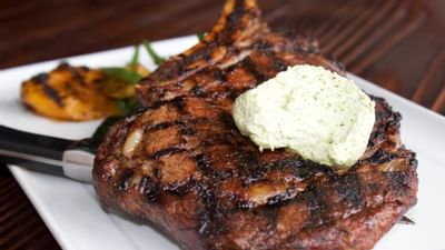 steak with butter on a plate