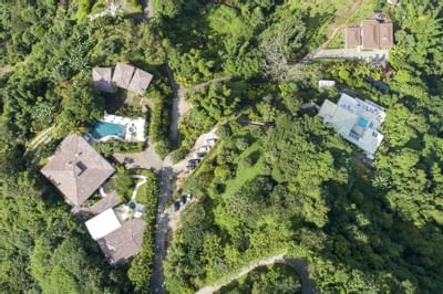 A aerial view of Retreat Costa Rica hotel and mountains
