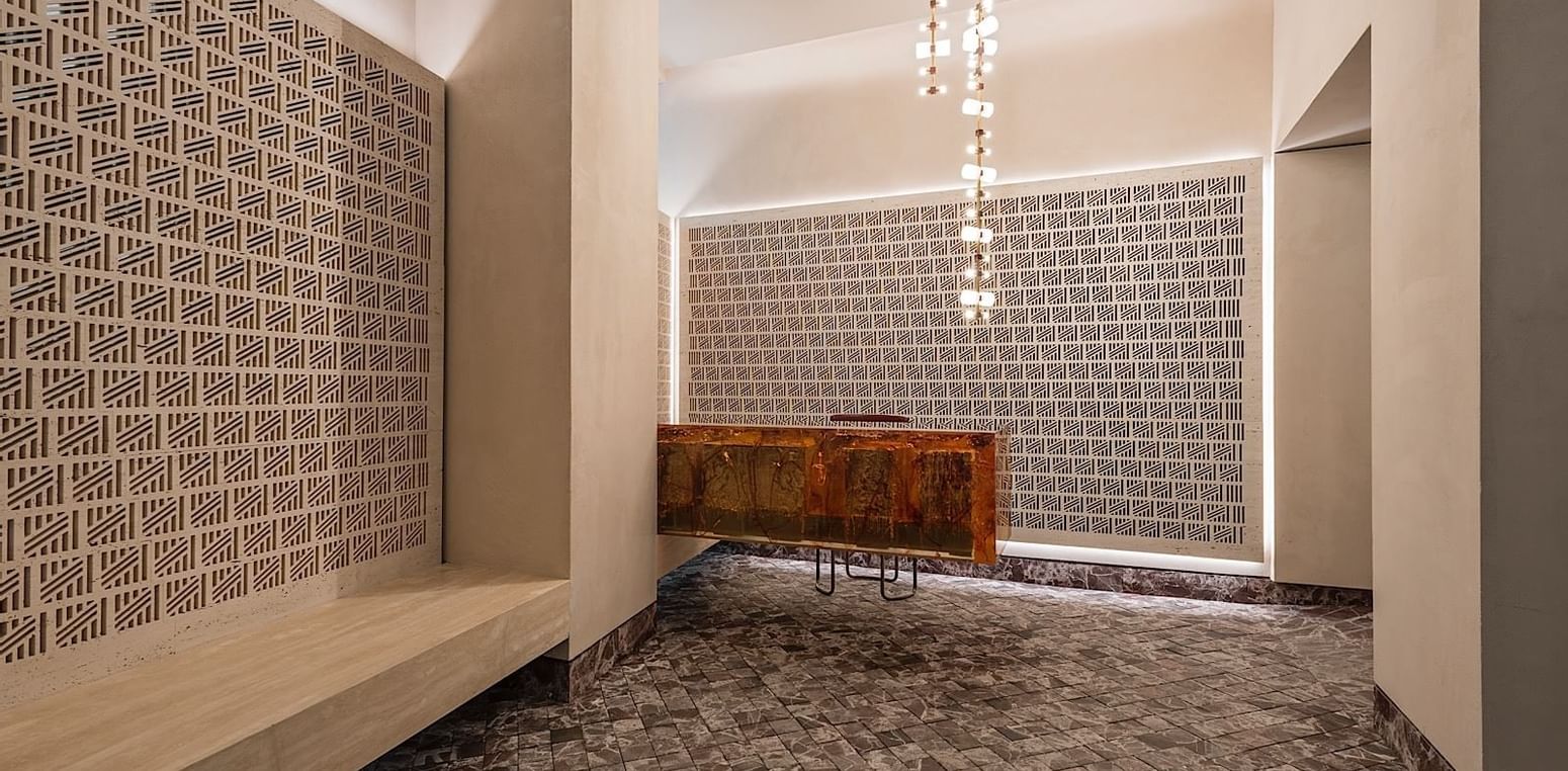 Chandelier & desk area in the lobby, Fendi Private Suites Hotel