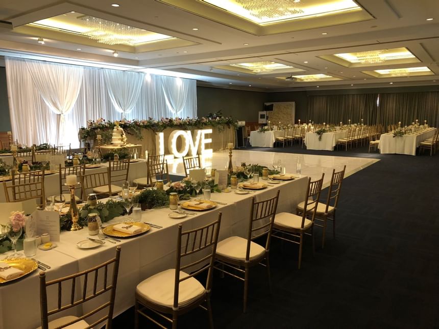 A view of the decorated wedding reception at the Duxton Hotel