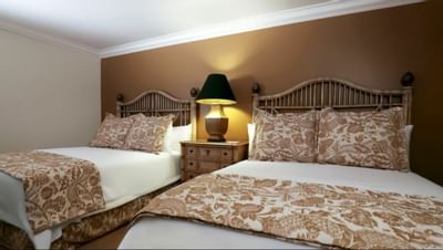 Twin beds in Double queen bedroom at Santa Barbara Inn