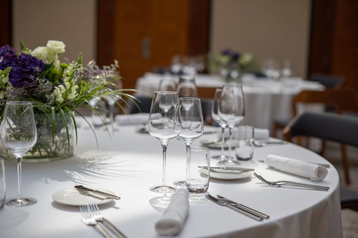 Banquet tables arranged with flowers at Almanac X Alcron Prague, Fine Dining Prague