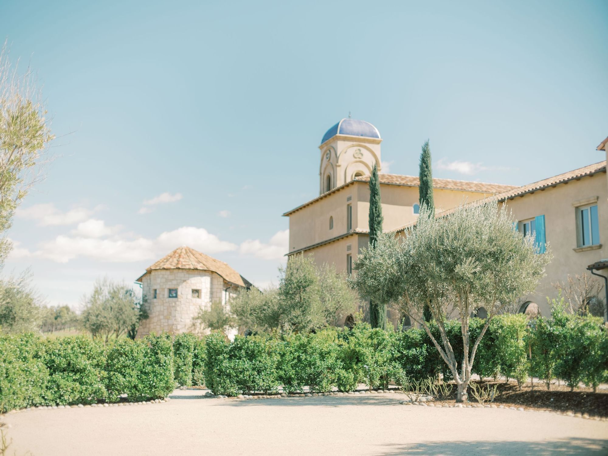 Looking through the landscape of Allegretto Resort at the Abbey