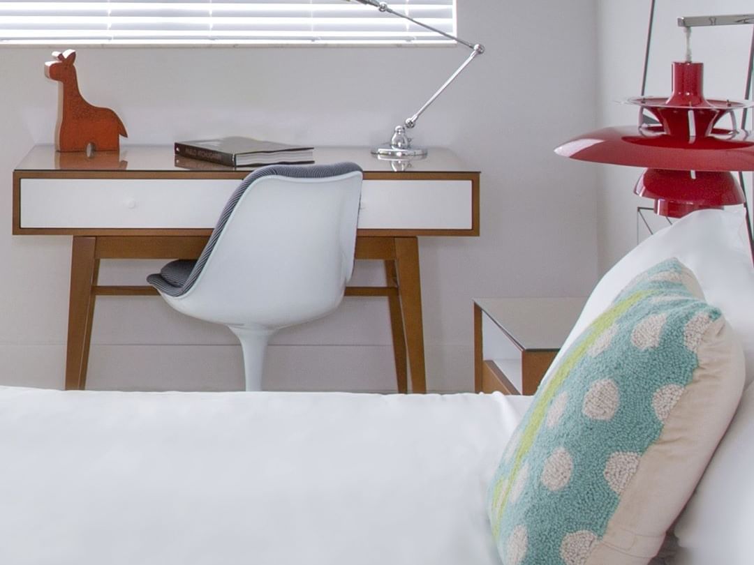 Image of a work desk next to the King size bed