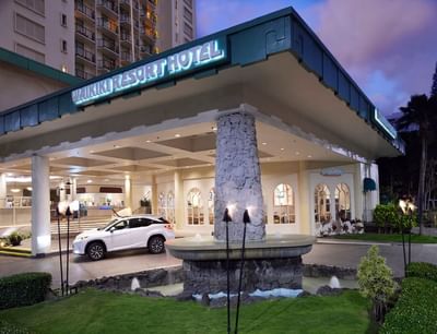 Water fountain & exterior of the entrance at Waikiki Resort Hotel by Sono