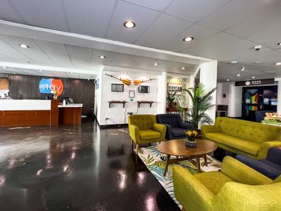 Cozy lobby area with sofas arranged at Stay Hotel Waikiki