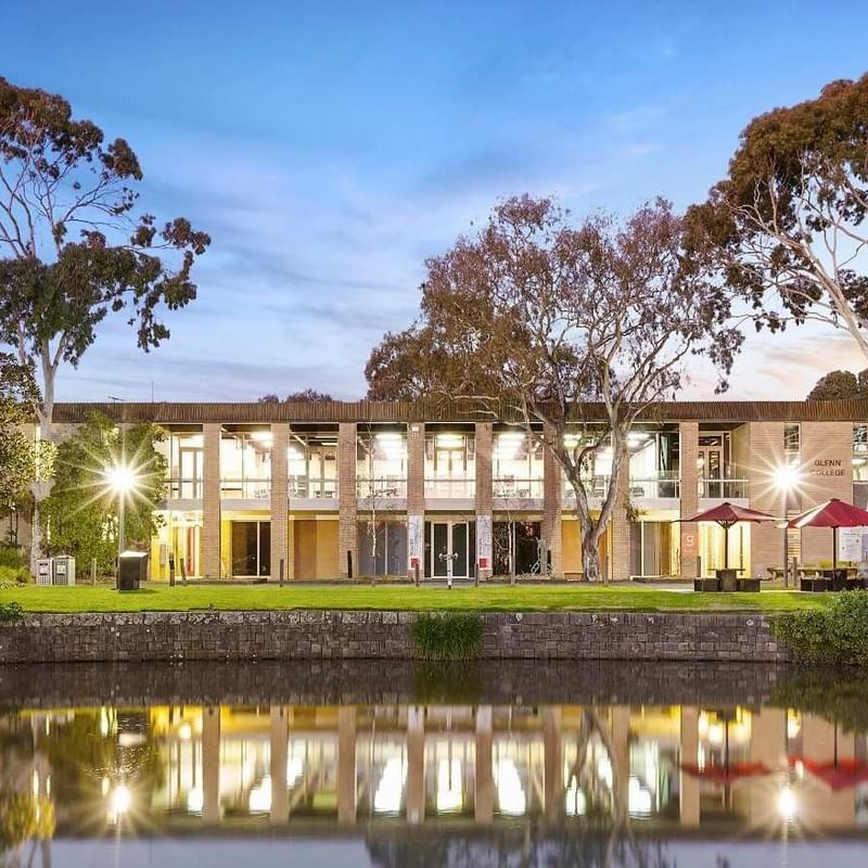 La Trobe University - Glenn College building with a reflection in the water.