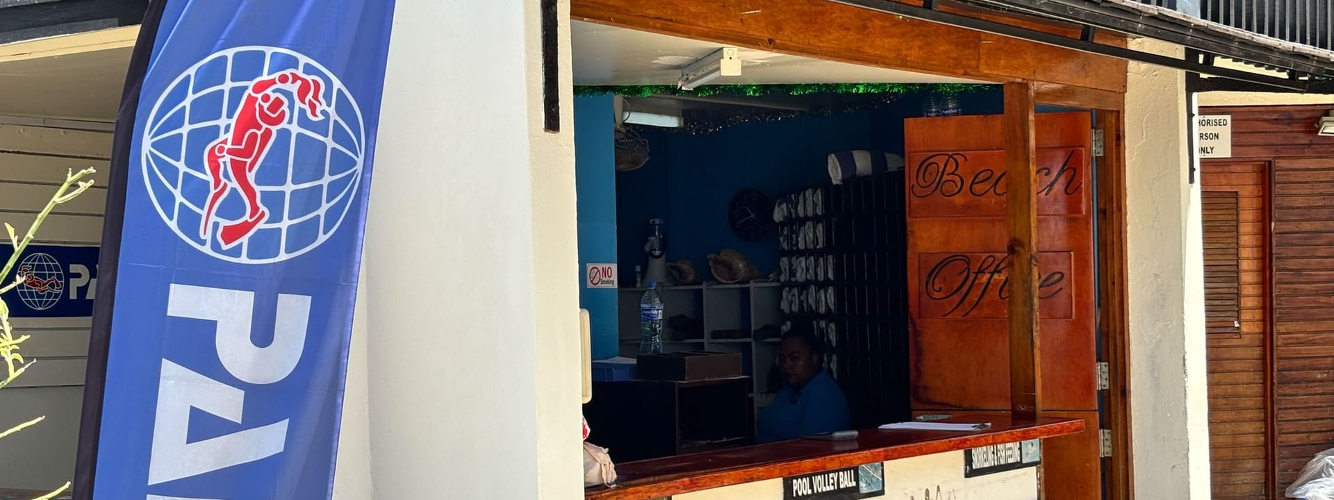 Beach Office with a banner reading PADI at Warwick Fiji Resort and Spa in Korolevu