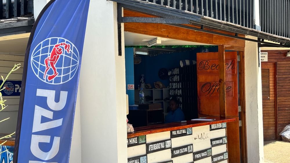 Beach Office with a banner reading PADI at Warwick Fiji Resort and Spa in Korolevu