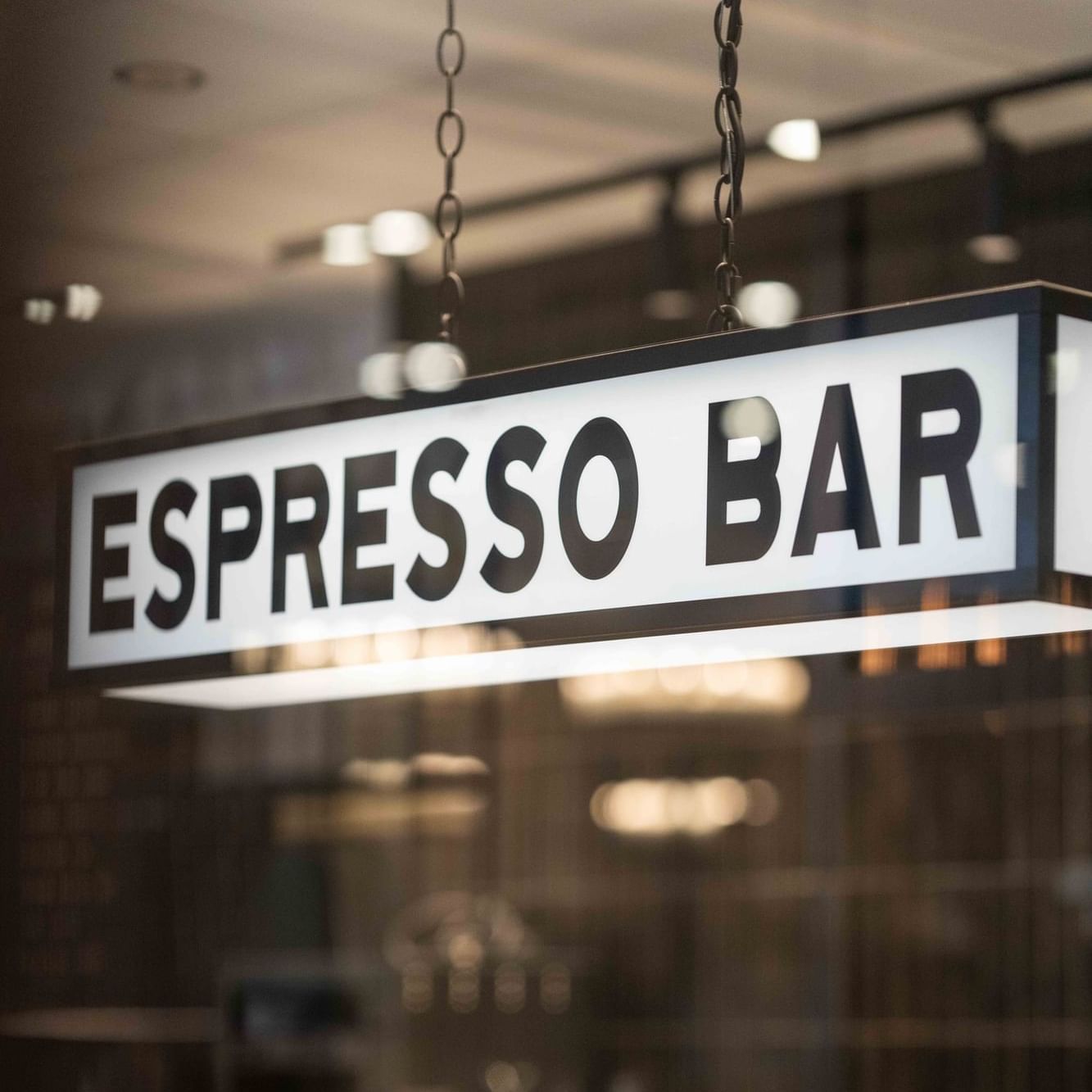 Close-up of Espresso Bar sign at The Artisan Hotel at Tuscan Village