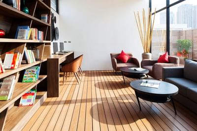 Library seating area at Maitria Mode Sukhumvit 15