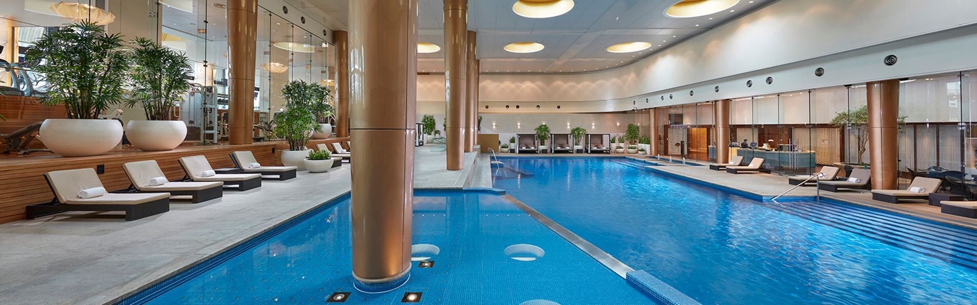Sunbeds by the indoor pool at Crown Hotels