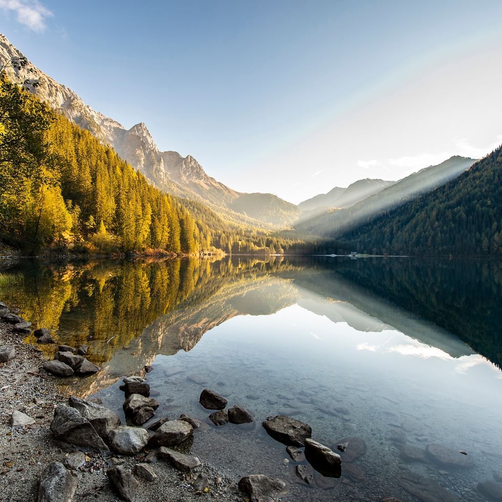 Anterselva lake by a mountain range near Falkensteiner Hotels