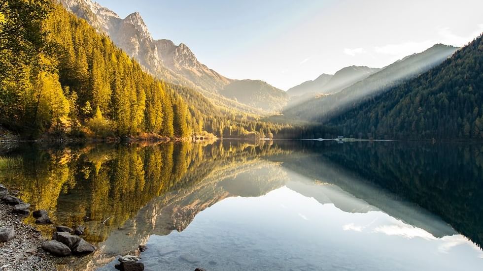 Anterselva lake by a mountain range near Falkensteiner Hotels