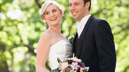 A wedding couple poses for a photo at Pullman Sydney Hyde Park