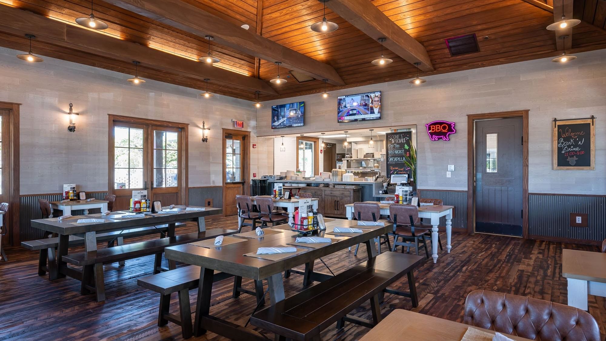 Dining tables & counter area in Bark ‘N Brine at Camp Creek Inn