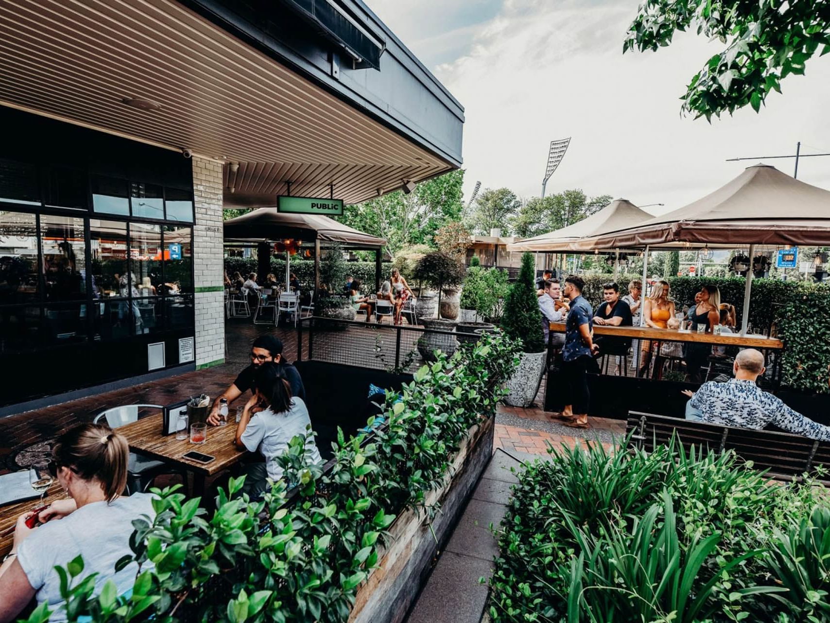 Outdoor dining area in Public Manuka near Hotel Knightsbridge