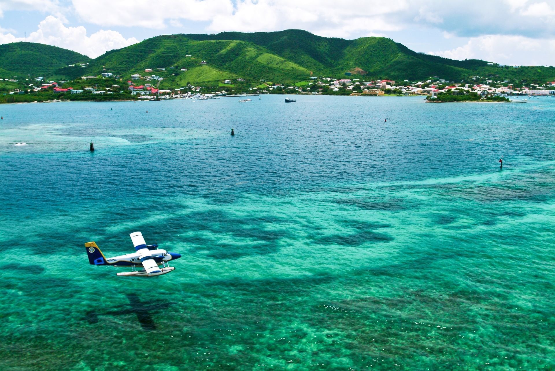 Aerial view of seaplane landing near The Buccaneer Resort St. Croix