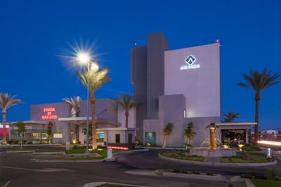 Front exterior view of Araiza San Luis at night