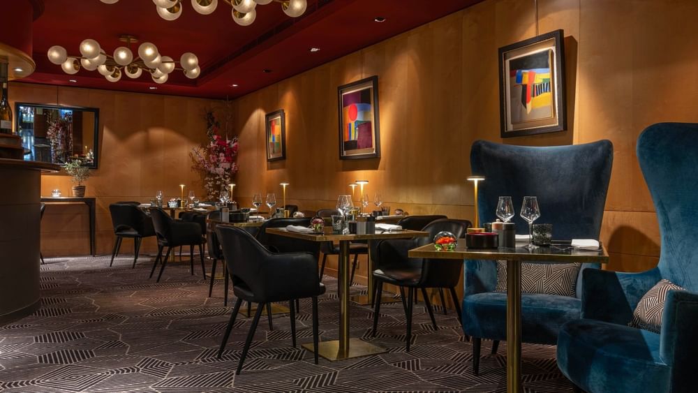 Elegant dining area at Restaurant Le W at Warwick Champs-Elysées Paris.