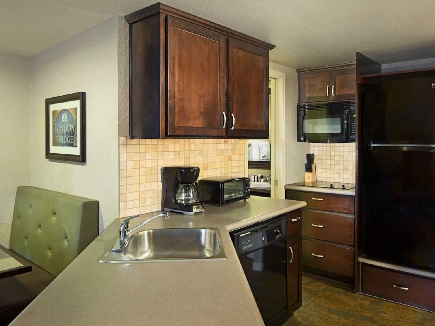 Two-bedroom Deluxe Resort suite kitchenette at London Bridge