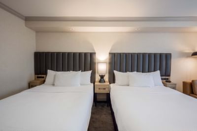 Standard Room, 2 Double Beds with central nightstand in best hotel rooms Winnipeg at Sandman Hotel & Suites Winnipeg Airport