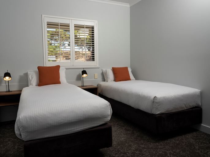 Twin beds near the window at Novotel Barossa Valley