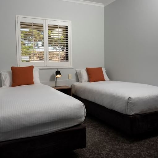 Twin beds near the window at Novotel Barossa Valley