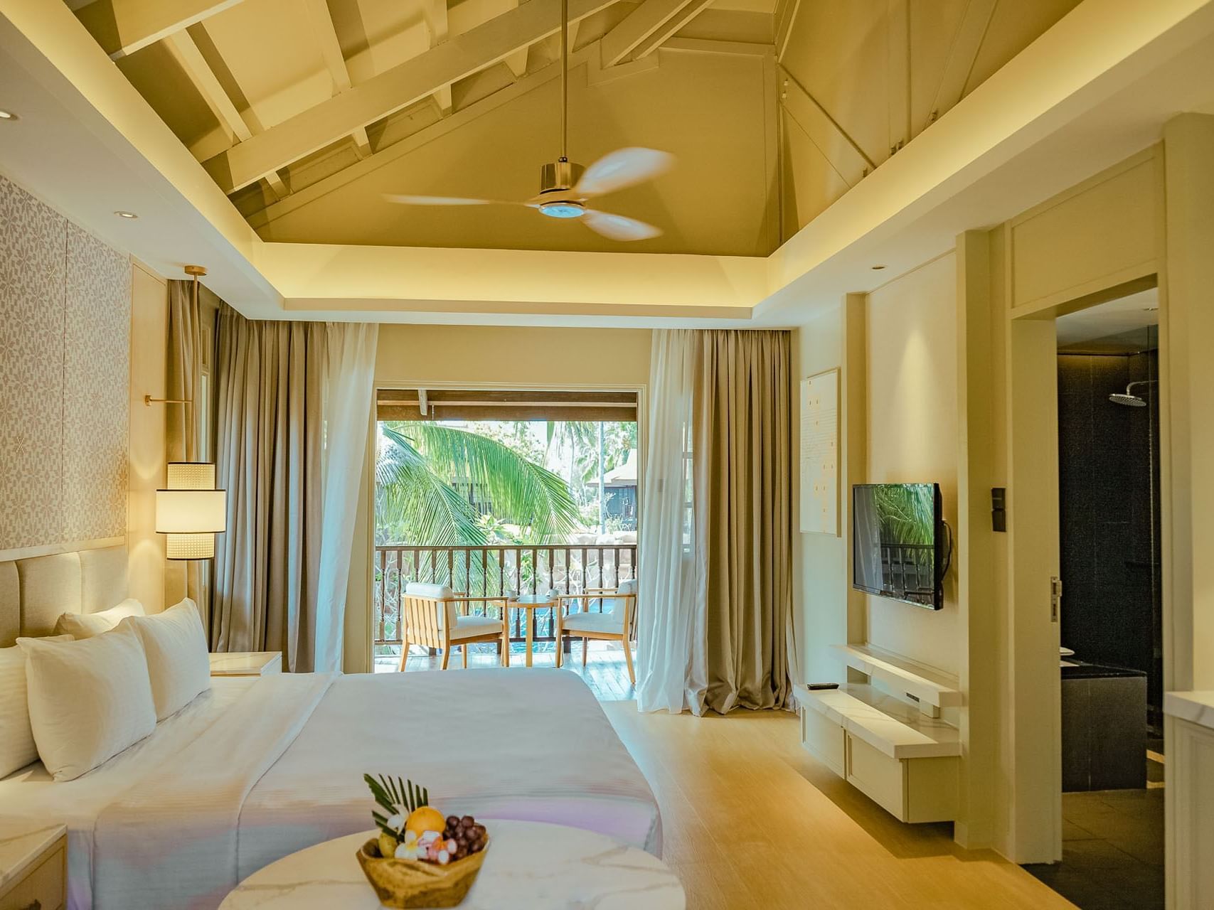 King bed & balcony in Pool Terrace, Pelangi Beach Resort & Spa