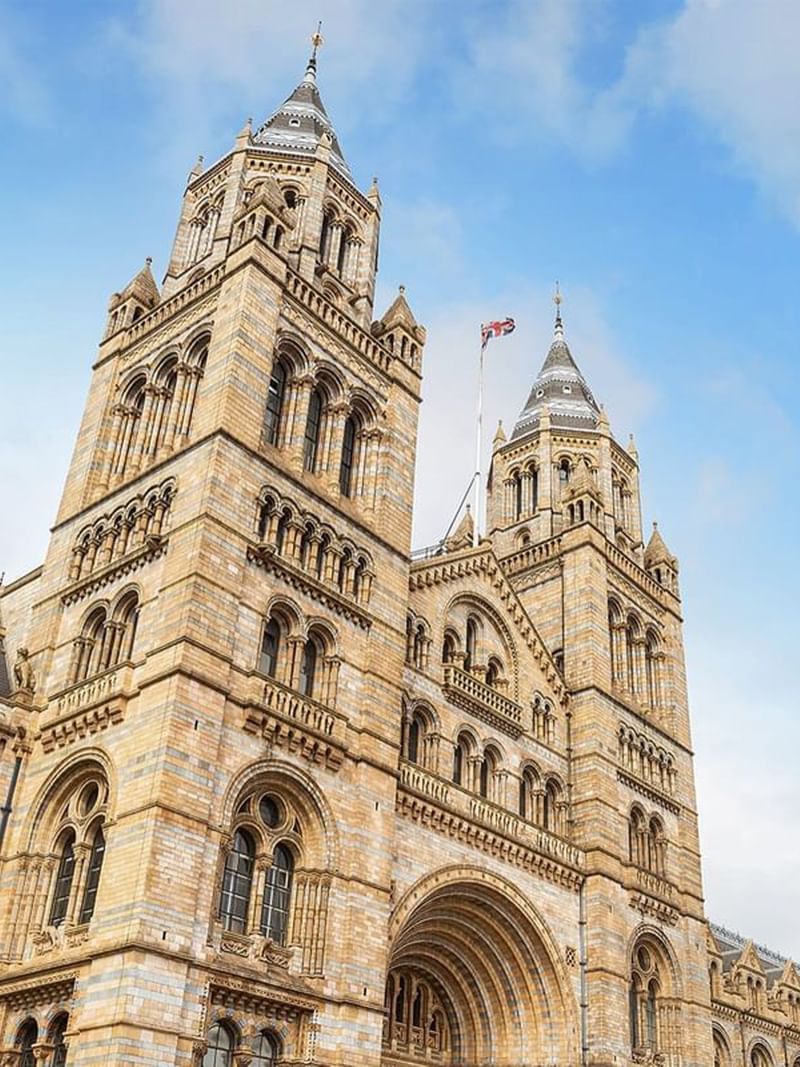 Towers of the Natural History Museum constructed of intricate brickwork near The Capital Hotel, Apartments and Townhouse