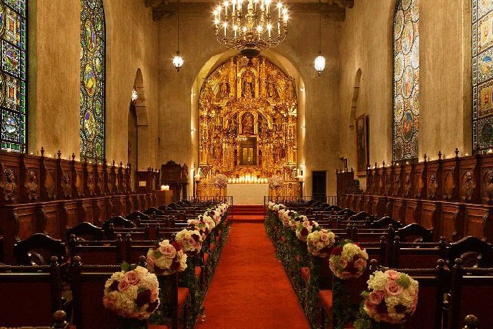 St Francis of Assisi chapel with flowers decorating the aisle