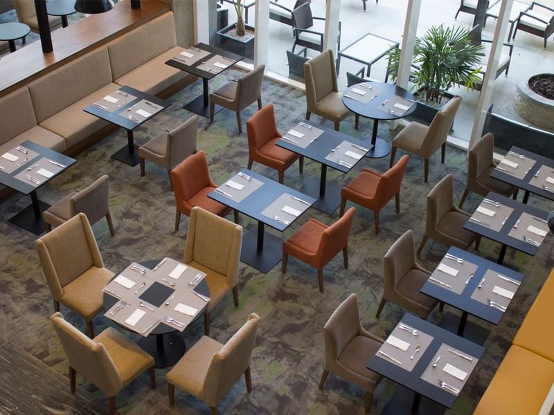 Top view of set dining tables and chairs at Fiesta Inn