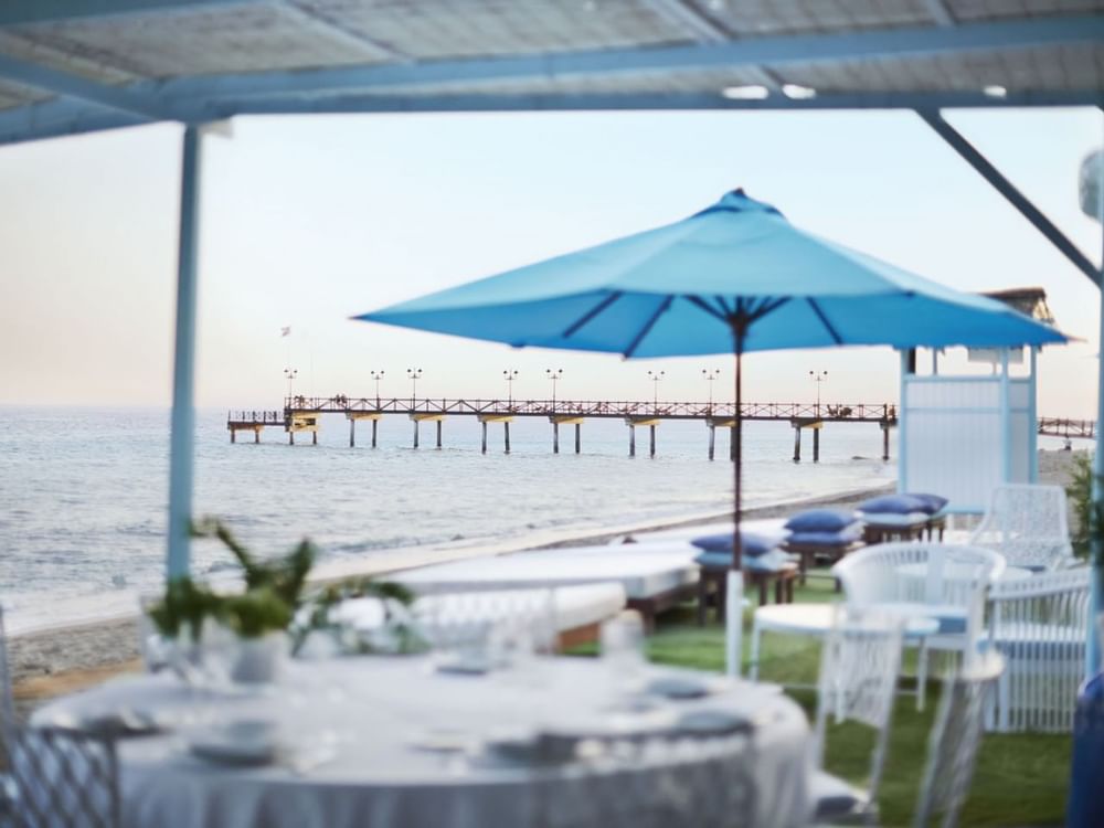 Outdoor dining area near the beach at Marbella Club Hotel