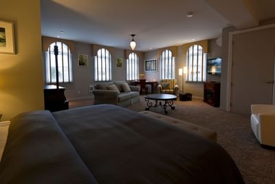 Living area by the bedroom in Apartment 202 at Retro Suites Hotel