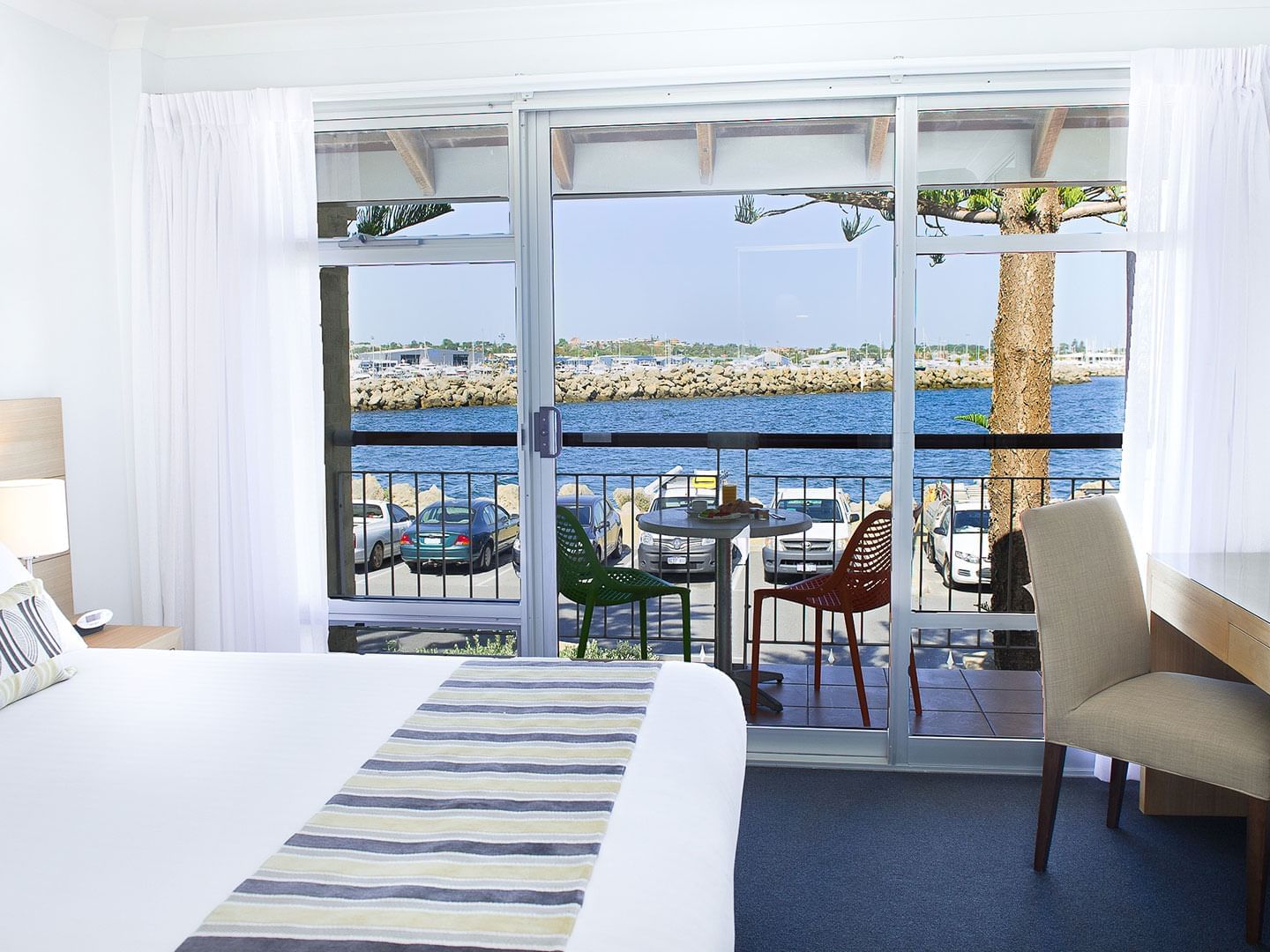 Bedroom with one bed in 2 Bedroom Harbour Sunrise apartment at Be Fremantle