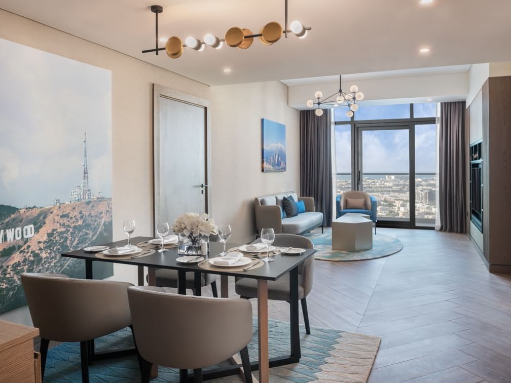 Spacious living area with dining table in Paramount Suite at Paramount Hotel Midtown