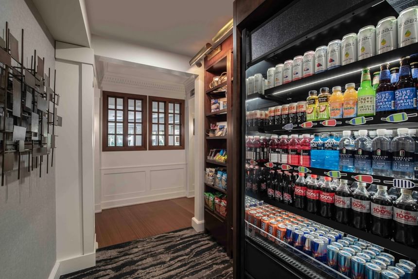 Walk-in pantry with open beverage fridge fully stocked with drinks at Portland Harbor Hotel