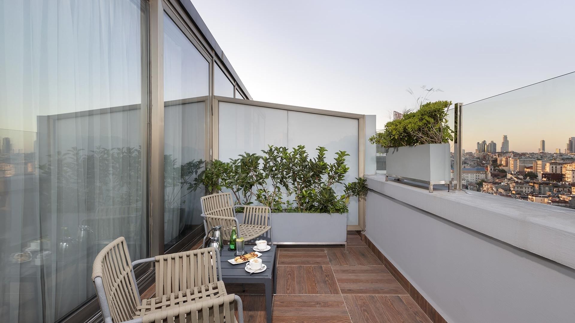 Balcony area with table arrangement in Executive Room at Titanic City Taksim