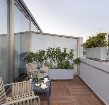 Balcony area with table arrangement in Executive Room at Titanic City Taksim