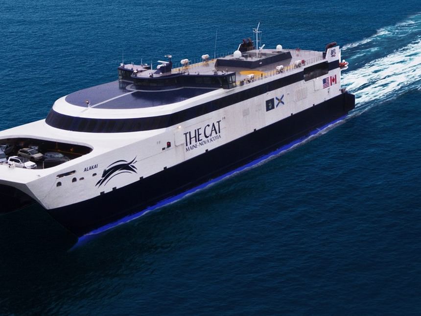 The CAT high-speed ferry cruising on the open blue ocean, a convenient transit option for Rodd Grand Yarmouth guests