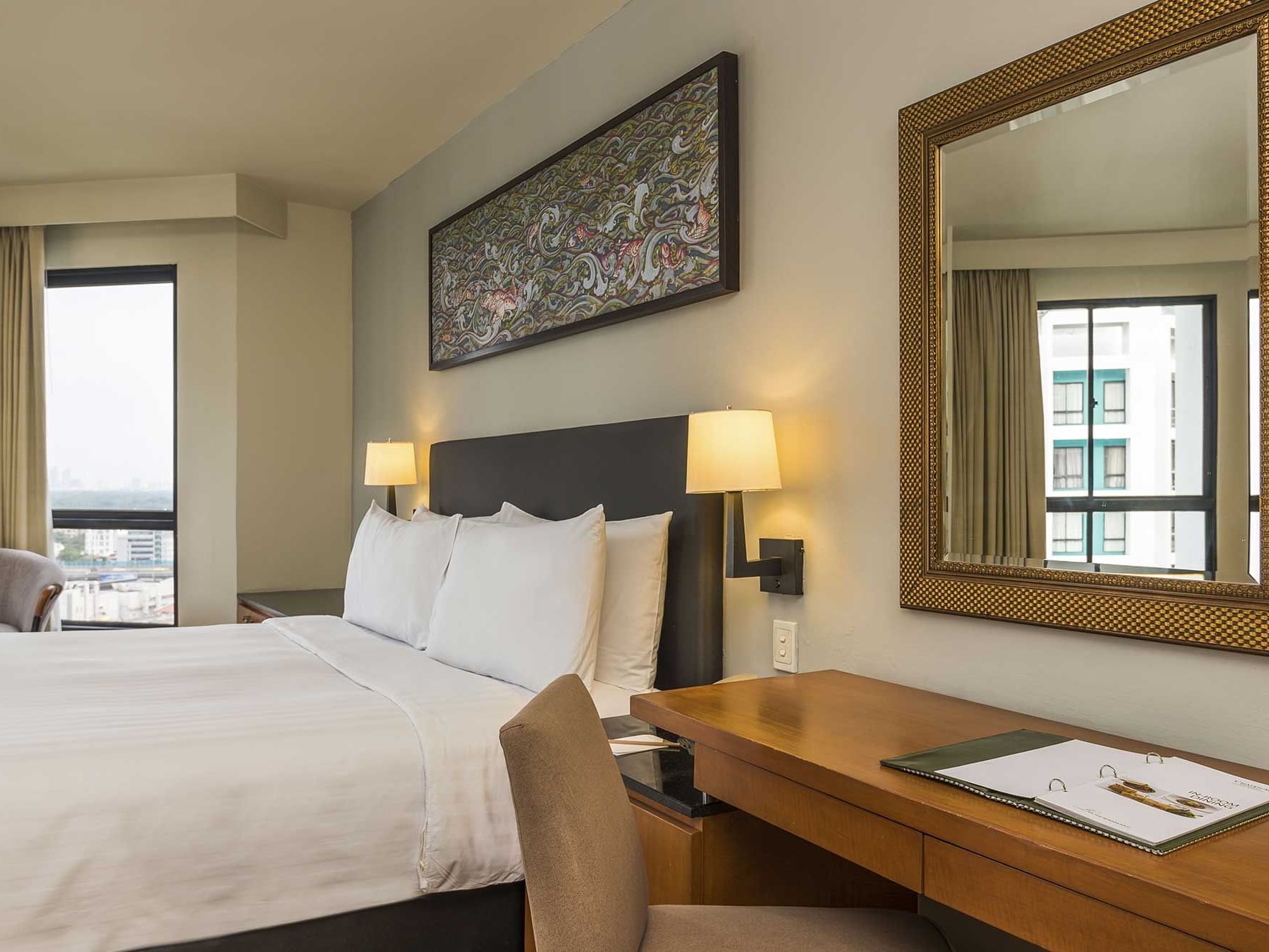 Bed in Grand Deluxe 1 Bedroom Suite at Chatrium Residence