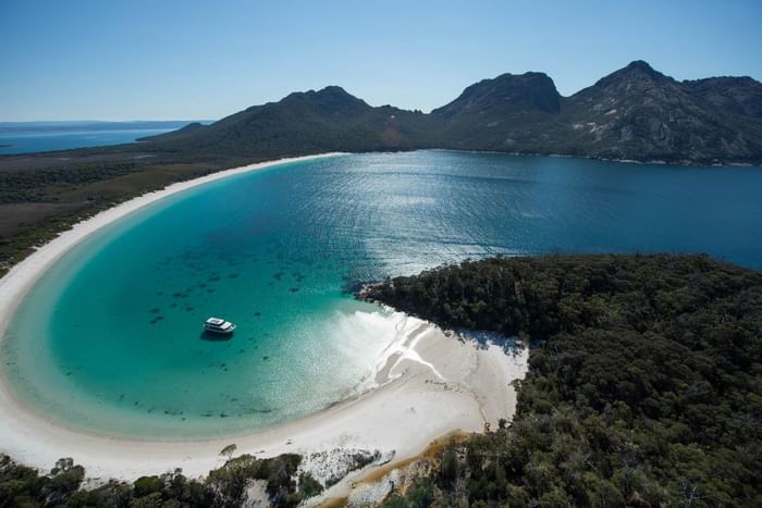 Aerial landscape view of mountains & sea near Freycinet Lodge