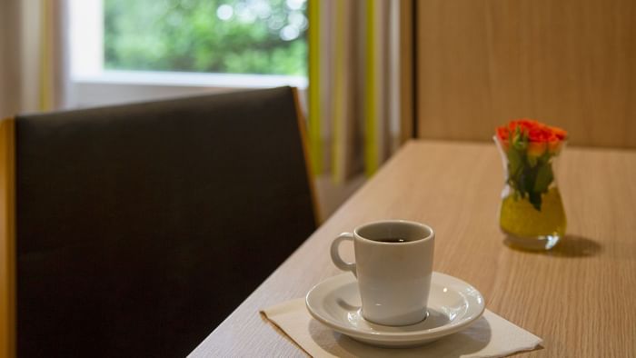 Close up on a tea cup on a table at  Le Clos de l'Orgerie