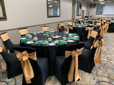 Banquet rounds arranged in the Ballroom at Bilmar Beach Resort