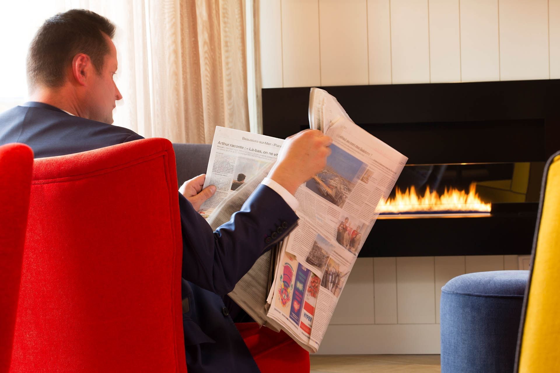 Homme près de la cheminée à Escale Oceania Saint-Malo