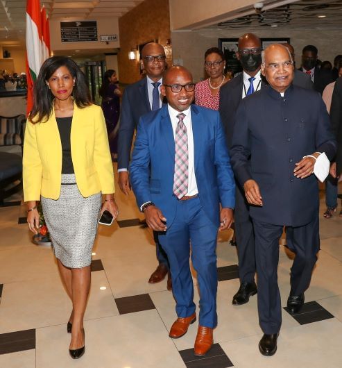 Three people walking at Jamaica Pegasus Hotel