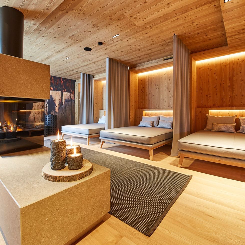 Relaxation area with beds in the spa at Falkensteiner Hotels