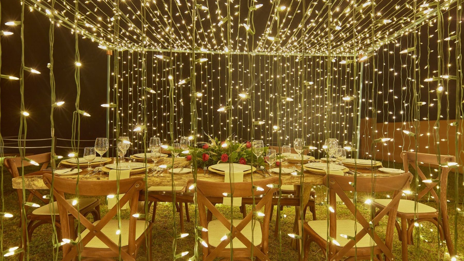 Open air dining table setup with fancy lights at GFA Veracruz